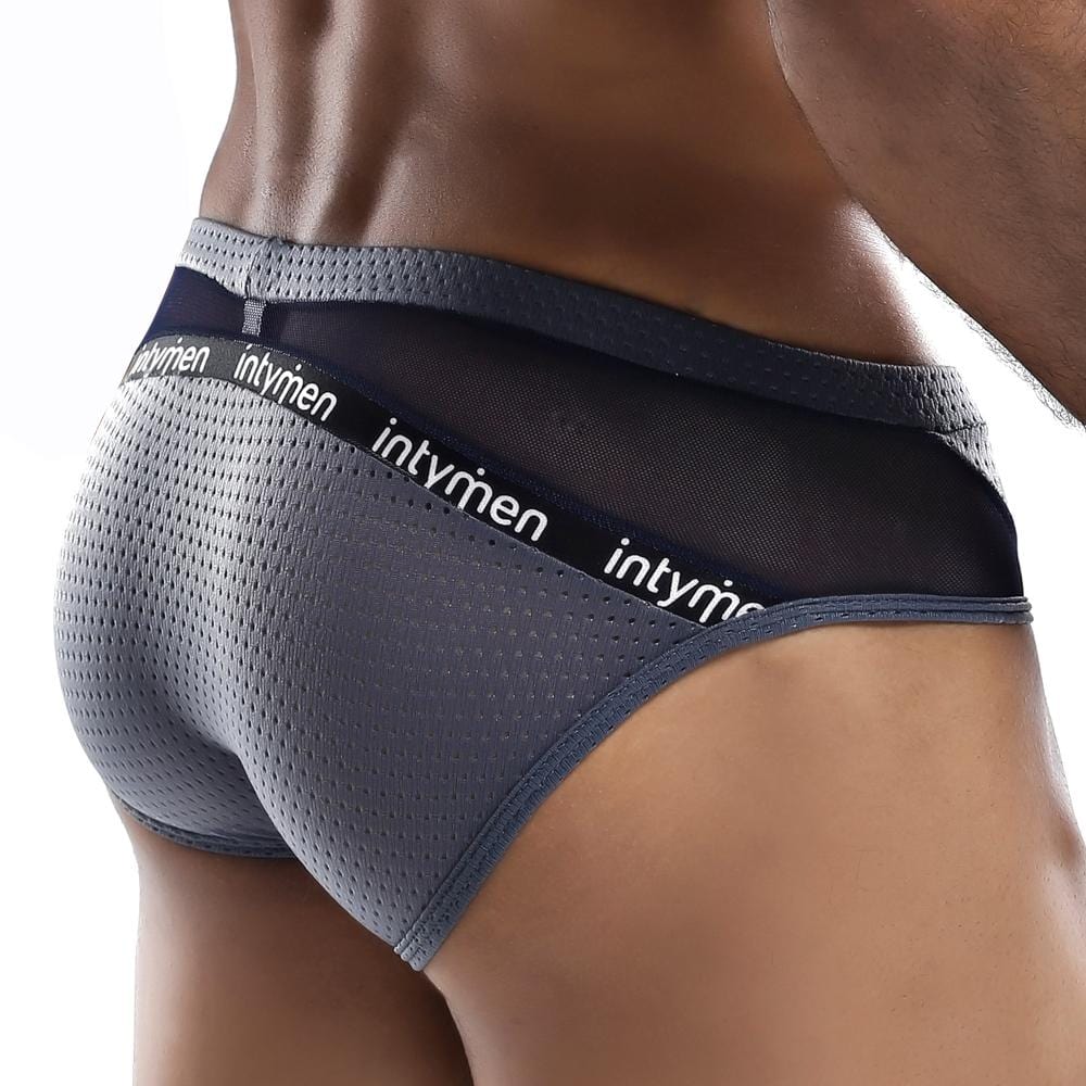 Intymen INJ027 Serenity Brief showcasing a stylish mesh and sheer design in grey and navy colors, highlighting its contoured pouch and comfortable fit.